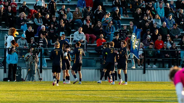 men's soccer celebration