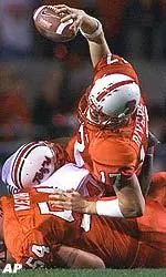 Philip Rivers dives over Maryland defenders to try and get a first down during the first half.