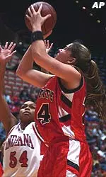 Kelly Greathouse shoots over an Indiana defender during the first half.