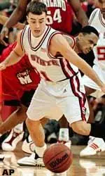 Archie Miller steals the ball away from Maryland's Juan Dixon during the first half.