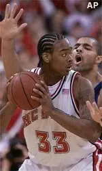 Josh Powell looks to make a pass during the first half of NC State's game vs. Duke Sunday.
