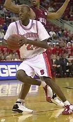 Julius Hodge (24), who scored a career-high 26 points, drives past South Carolina's Rolando Howell.