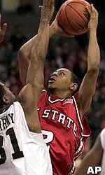 Anthony Grundy goes up against Ervin Murray during the second half.