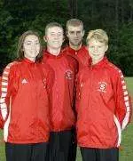 Returning-All-Americans (l-r) Megan Coombs, Chad Pearson, Andy Smith and Kristin Price will lead the Wolfpack in the 2002 cross country season.
