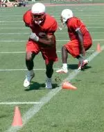 As they finish their first week, freshman wideouts Brian Clark and Richard Washington are getting used to life with the Pack.