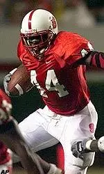 NC State running back T.A. McLendon (44) breaks away from Wake Forest defenders during the first half.