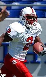 Bryan Peterson runs the ball into the end zone in the Wolfpack's win over Navy.