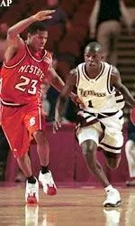 Scooter Sherrill pressures Massachusetts' Michael Lasme during the first half.