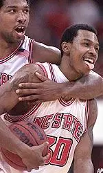 Marcus Melvin celebrates with teammate Clifford Crawford near the end of the game against North Carolina.