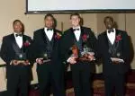 NC State's four All-ACC football players -- (l-r) Andre Maddox, Sean Locklear, Philip Rivers and Jerricho Cotchery -- all were honored at the annual NC State football banquet.
