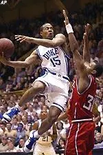 Clifford Crawford, who scored 17 points, defends the drive of Duke's Sean Dockery (15).