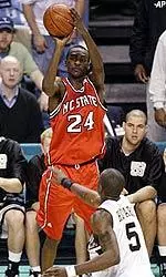 Julius Hodge shoots a 3-point over Josh Howard of Wake Forest during their ACC Tournament game.