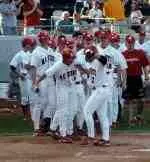Justin Riley celebrates a home run vs. Florida State in a doubleheader game earlier this year at Kinston. The Wolfpack hopes to have several similar celebrations when it plays yet another Saturday doubleheader at Virginia on Saturday, April 19.