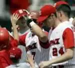 Justin Riley is congratulated after a home run. Riley is one of four NC State players with 10 or more homers this season.