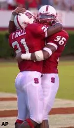 ACC Specialist of the Week Tramain Hall (#21) is congratulated by Andre Maddox following his 67-yard punt return.