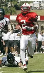 Greg Golden outruns Texas Tech's Jarrett Hicks and Cody Fuller as he returns an interception 71 yards for a touchdown in the first quarter.