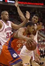 Jordan Collins and Scooter Sherrill trap Clemson's Sharrod Ford.
