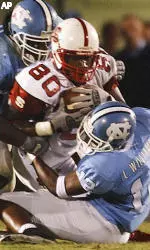 Tight end T.J. Williams fights for yardage against UNC.