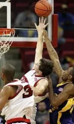 NC State's Andrew Brackman records one of his three blocked shots against ECU.