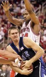 Duke's Shavlik Randolph, center, battles NC State's Ilian Evtimov, left, and Marcus Melvin, pictured, for the ball during the first half. Melvin led the Wolfpack with 18 points.