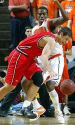 Ilian Evtimov puts the ball on the floor.