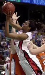 Kaayla Clones shoots between several Clemson players in the second half.