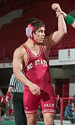 Senior 149-pounder Alex Hernandez took a 4-2 decision over John Cox on Saturday night, but Navy defeated the Wolfpack, 34-6.