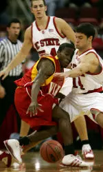 Virginia Military Institute's Matt Coward tries to drive on North Carolina State's Engin Atsur during the first half.