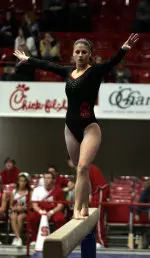 Senior Andrea Petrocelli notched a career-high 9.9 on beam to win beam and help the Pack win the Hearts Invite.