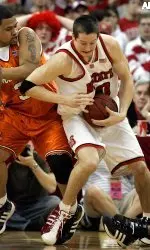 Andrew Brackman is guarded by Virginia Tech's Shawn Harris during the first half.