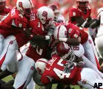 The NC State defense will look to smother UNC this Saturday.
