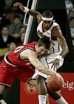 Andrew Brackman goes after a loose ball in the first game against B.C.