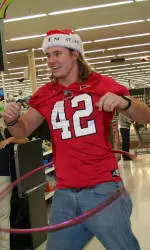 NC State linebacker Audie Cole during last year's shopping spree.