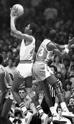 Thurl Bailey goes against Michael Jordan