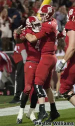 Mike Glennon celebrates one of his three TDs passes in the win over Clemson.