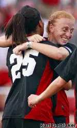 Seniors Tanya Cain (25) and Alex Berger celebrate the winning goal
