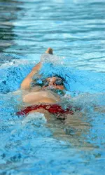 Senior Ivan Kopas swimming the backstroke