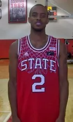 Lorenzo Brown models jersey the Pack will wear at the Jimmy V Classic.