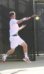 Freshman Austin Powell won his 15th match of the spring.
