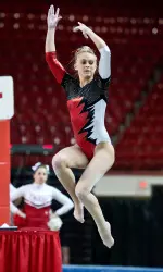 Freshman Brittni Watkins on floor exercise