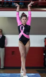 Junior Stephanie Ouellette on beam
