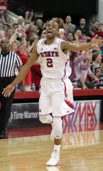 A joyous Lorenzo Brown celebrates the Pack's win over top-ranked Duke.