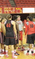 Coach Moore addresses the team at the end of the first practice session