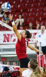 Redshirt sophomore Morgan Cormier with a block at the net