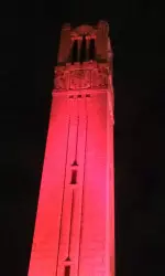 NC State's Memorial Belltower is lit up Red for another Pack victory.
