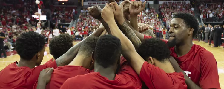 Men's Basketball Team Huddle