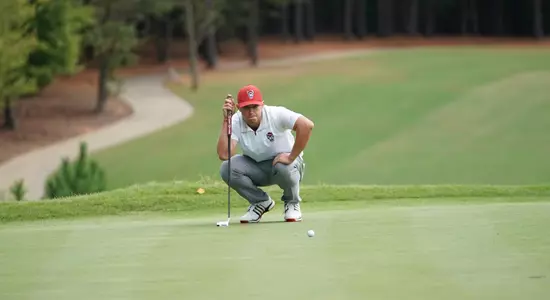 Brett McLamb reading putt