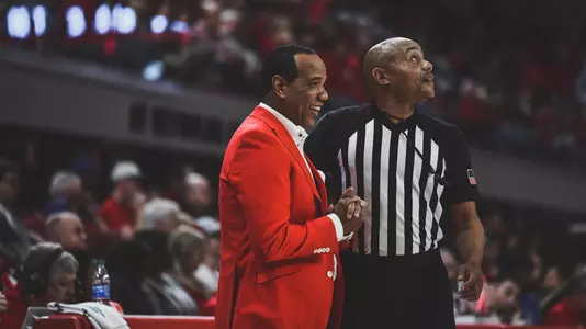Kevin Keatts smile with ref
