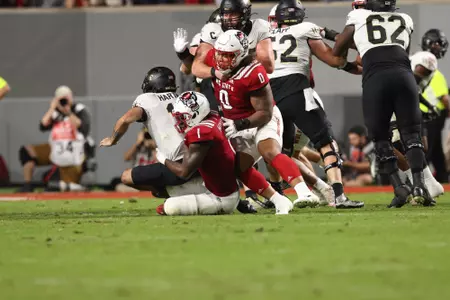 Isaiah Moore sacks Wake Forest quarterback Sam Hartman