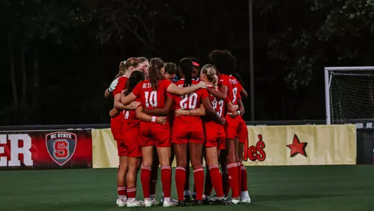 NC State_TeamHuddle_WSOC_vsUNC23